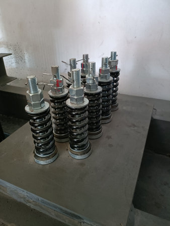 Close-up of a freight elevator steel shock absorber