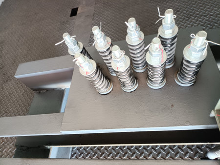 Close-up of a freight elevator steel shock absorber