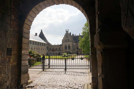 Inner courtyard of Bad Benthem Castle seen from under an archのeditorial素材