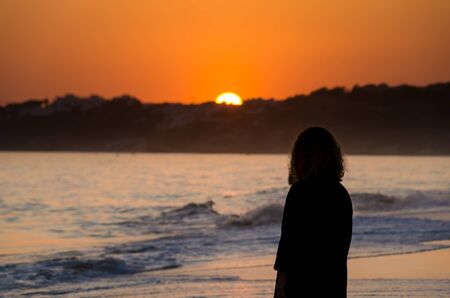 Sunset on the beach of Our Lady of Rocha in Lagoa, Algarve region, Portugal