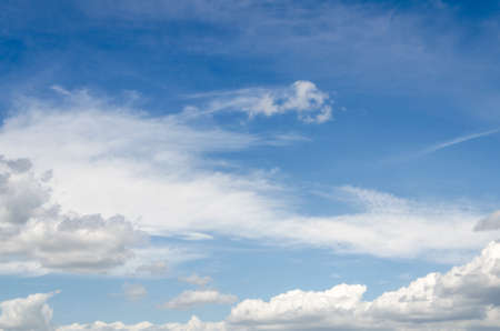 White clouds in a bright blue sky. The beauty of the nature