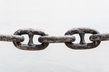 Rusty steel chain, on white background. Connected