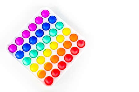 Sensory anti stress toy Pop it Fidget Toy Colorful, on white background. Copy spaceの写真素材
