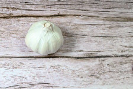 Fresh garlic on rustic wooden table. Garlic clovesの写真素材