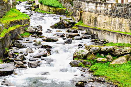 Image of the Garonne River as it passes through the beautiful village of Vielha, Aran Valley, Leridaの写真素材