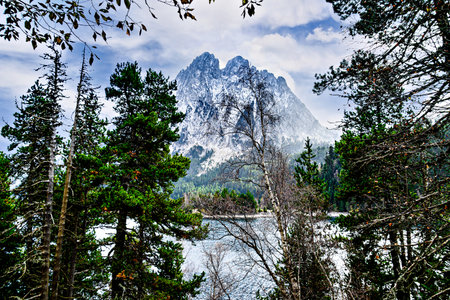 Image of Sant Maurici Lake with snow-capped mountains, in the Aigües Tortes National Park, in the...