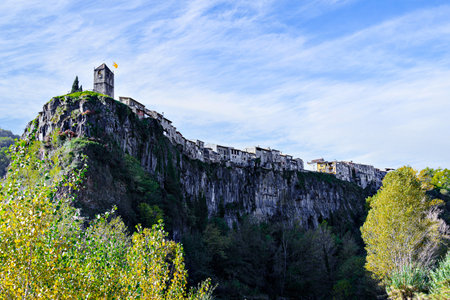 Views of the town of Castellfollit de la Roca, settled on a basaltic cliff in the region of La Garrotxa, Girona, Cataloniaの写真素材