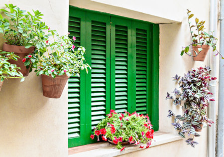 Beautiful window views of the famous town of Valldemosa, Mallorca, Balearic Islands, Spainの写真素材