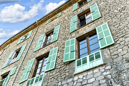 Beautiful window views of the famous town of Valldemosa, Mallorca, Balearic Islands, Spainの写真素材