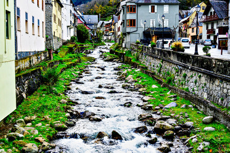 Image of the Garonne River as it passes through the beautiful village of Vielha, Aran Valleyの写真素材