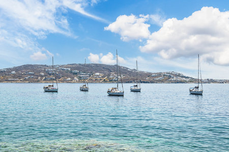 Myconos, views of the white houses with their cobbled streets. Village bathed by the South Aegean Sea, in the Cyclades, Greeceの写真素材