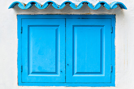 Typical white house with blue door in the beautiful city of Mojacar, AlmerÃ­a, Andalusiaの写真素材
