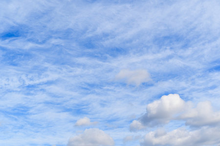 Blue sky background with tiny clouds. Nature cloud blue sky background.の写真素材