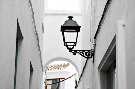 Old classic lamppost with ornaments in the streets of Marbella, Malaga. Andalusiaの写真素材