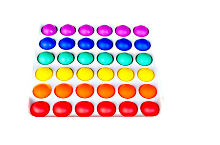 Sensory anti stress toy Pop it Fidget Toy Colorful, on white background. Copy spaceの写真素材