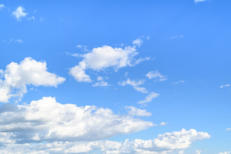 blue sky background with tiny clouds, soft focus, and copy spaceの写真素材