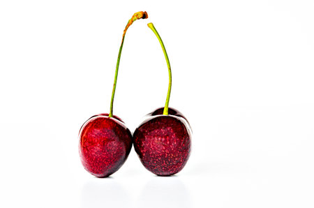 Red cherries isolated on white background.の写真素材