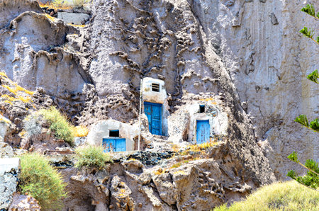 Traditional cave houses in the port of Fira, Santorini, Greeceの写真素材