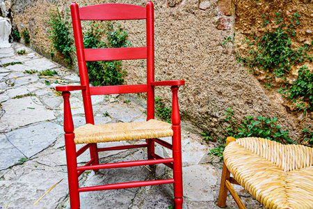 Handmade redwood chair with wicker seatの写真素材