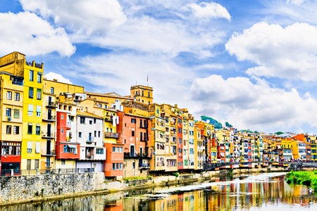 Colorful houses along the Onyar River in the city of Girona, Catalonia, Spainの写真素材