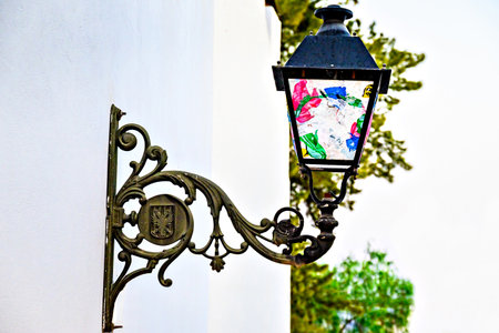 Ornate lamppost with paintings in Altea, Alicante