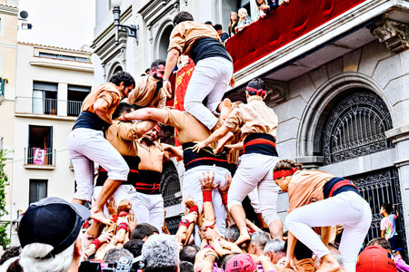 Igualada, Barcelona; August 25, 2024: Performance of the human tower by the Xiquets de Reus group at...