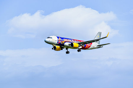 Barcelona, â€‹â€‹Spain; April 5, 2025: A Vueling Airbus A320 landing at Josep Tarradellas...