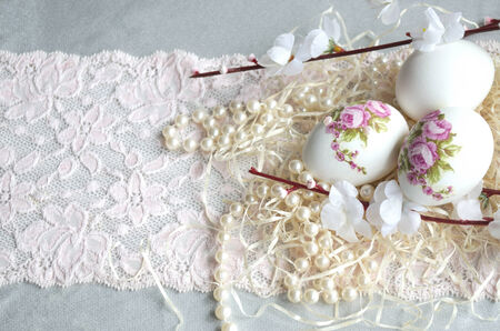 Egg decoupage, flowers, lace and pearl