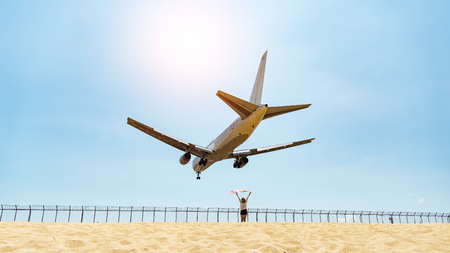 Phuket thailand,25-3-2017;Many people acting for take photo with the plane,The plane is landing to phuket international airport at mai khao beach phuket thailand.のeditorial素材
