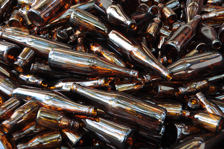 Brown glass bottle for recycling の写真素材