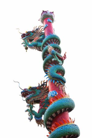 dragon statue on pole on white backgroundの写真素材