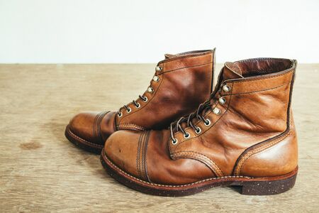 vintage style picture with safety boots and Industrial boots for constructionの写真素材