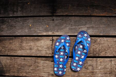 Slippers on the wood floorの写真素材