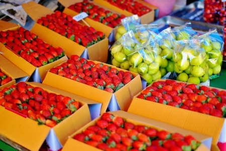 Fresh strawberry in box in marketの写真素材