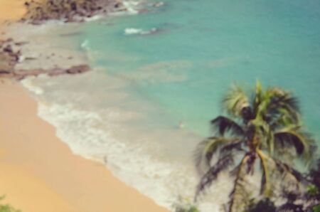 Aerial view blur tropical sunset beach abstract background.Retro color style.の写真素材