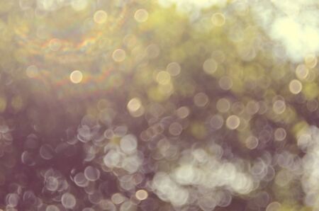 Bokeh sun light leaf nature abstract background.Retro color styleの写真素材