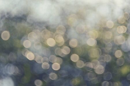 Bokeh sun light leaf nature abstract background.Retro color styleの写真素材