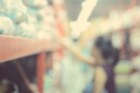 Blur woman shopping in shopping center mall abstract background.Retro color style.の写真素材