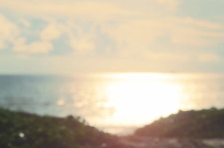 Blur walking way to tropical sunset beach abstract background.Retro color style.
