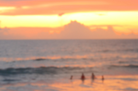Blur people relax on tropical sunset beach abstract background.Travel concept.の写真素材
