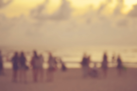 Blur people relax on tropical sunset beach abstract background.Travel concept.の写真素材