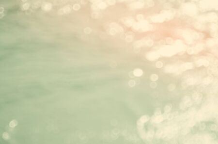 Blur bokeh smooth wave beach abstract background.Retro color style.の写真素材