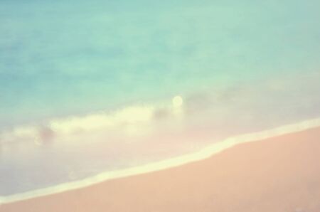 Blur bokeh smooth wave beach abstract background.Retro color style.