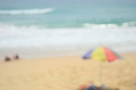 Blur umbrella on tropical beach abstract background.Travel concept.の写真素材