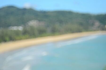 Blur tropical beach with bokeh wave abstract background.Retro color style.の写真素材