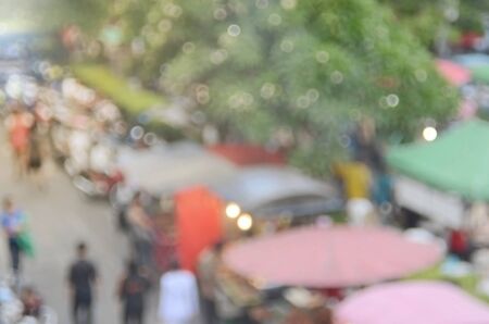 blur people shopping at local street market abstract background.の写真素材