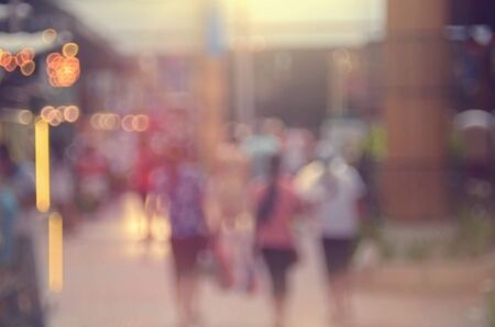 Blur people walking in shopping center mall abstract background.Retro color style.の写真素材