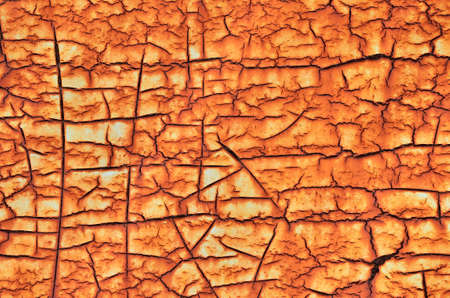 Close up old crack orange metal texture background.の写真素材