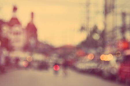Blur traffic road with bokeh light abstract background. Retro color style.の写真素材