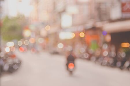 Blur traffic road with bokeh light abstract background. Retro color style.の写真素材